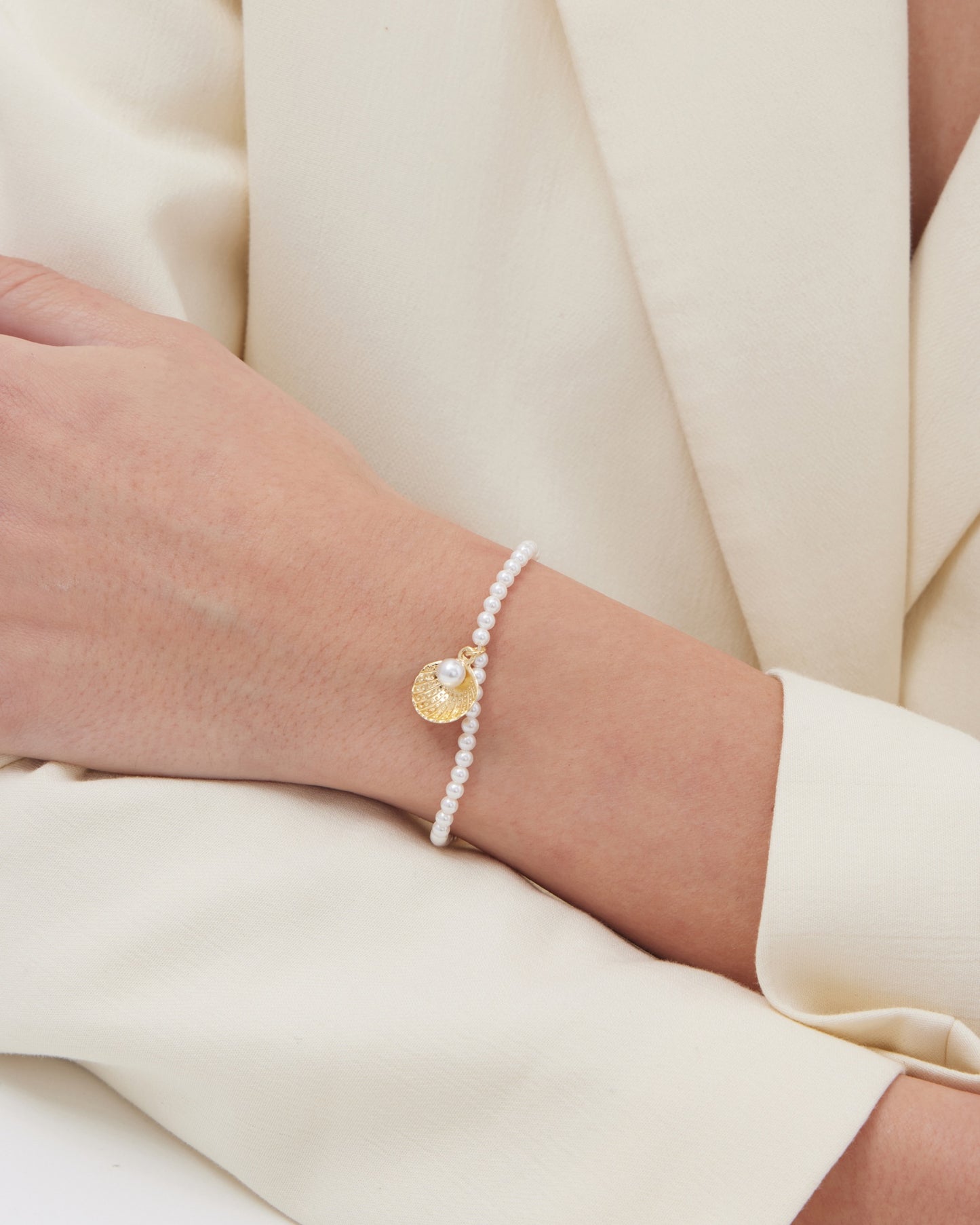Pulsera Solene concha con perla en Plata baño Oro