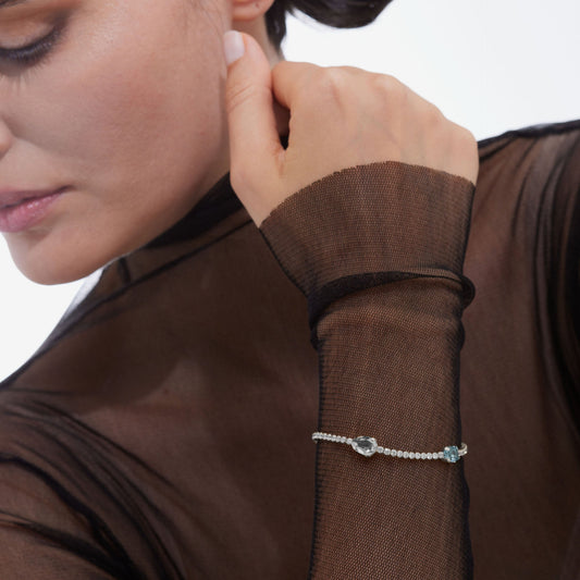 Pulsera Clarity cristales riviere y cristal azul en Plata baño Rodio