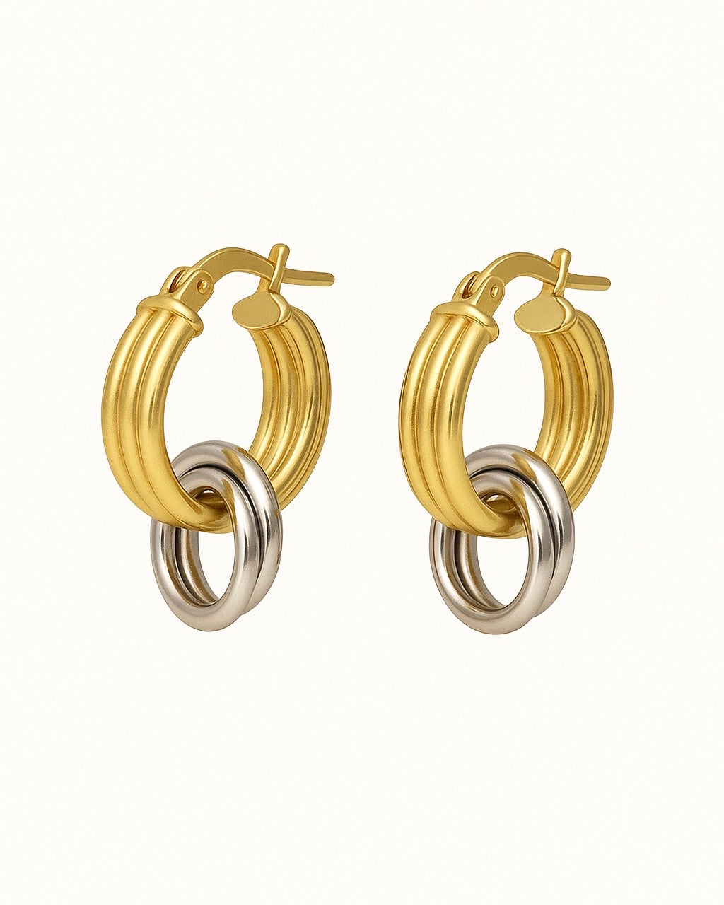 Nivola circle hoop earrings in gold and rhodium plated silver