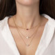 Collar triple estrella perla fuchsia de Rebekka en oro cover