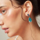 Essential tear light turquoise earrings in silver cover