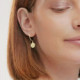 Zodiac gemini crystal hoop earrings in gold plating cover
