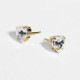 Well-loved gold-plated stud earrings with white crystal in heart shape cover