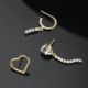 Well-loved gold-plated hoop earrings with white crystal in waterfall shape cover
