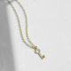 Pure Love key crystal necklace in gold plating cover
