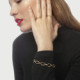 Viena gold-plated rigid bracelet in waves shape cover