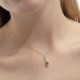Gemma gold-plated short necklace with champagne in oval shape cover