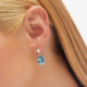 Magnolia sterling silver short earrings with blue in tear shape cover
