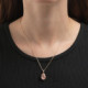Rose gold-plated short necklace with pink crystal in tear shape cover