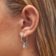 Vera butterfly crystal earrings in silver cover