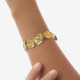 Fullness gold-plated adjustable bracelet with green crystal in texture shape cover