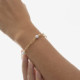 Pulsera ajustable perla y eslabones bañada en oro cover
