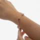 Inspire gold-plated adjustable bracelet with pink crystal in rectangle shape cover