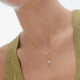 Milan gold-plated curve shape necklace with pearl and chain cover