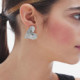 New York rhodium-plated satin-finish heart shape earrings cover