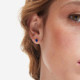 Cinnamon gold-plated stud earrings with blue crystal in oval shape cover