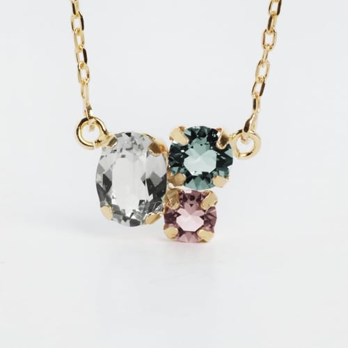 Alexandra crystals chrysolite necklace in gold plating.