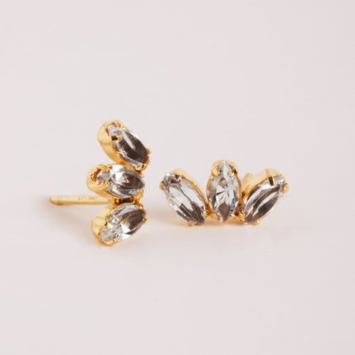 Las Estaciones climber crystal earrings in gold plating.