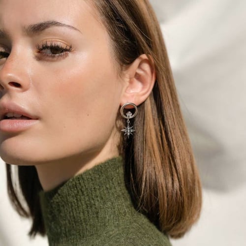 Rebekka star crystal earrings in silver