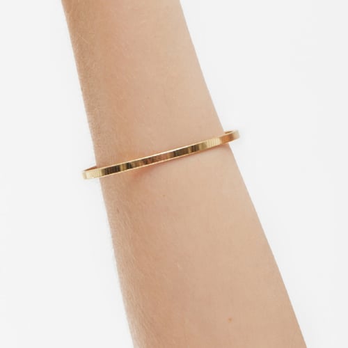 Cairo gold-plated rigid bracelet in flattened shape