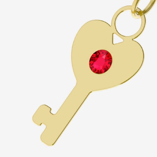 Abalorio llave rojo bañado en oro