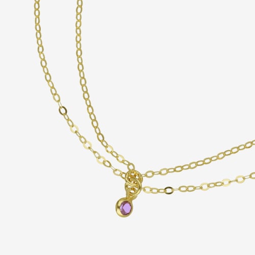 Tobillera doble cadena color violeta bañada en oro