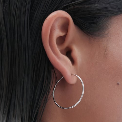 Minimal sterling silver hoop earrings in midium shape