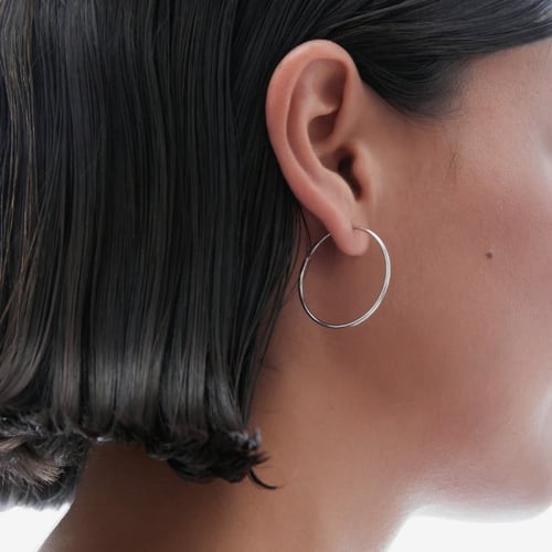 Minimal sterling silver hoop earrings in small shape