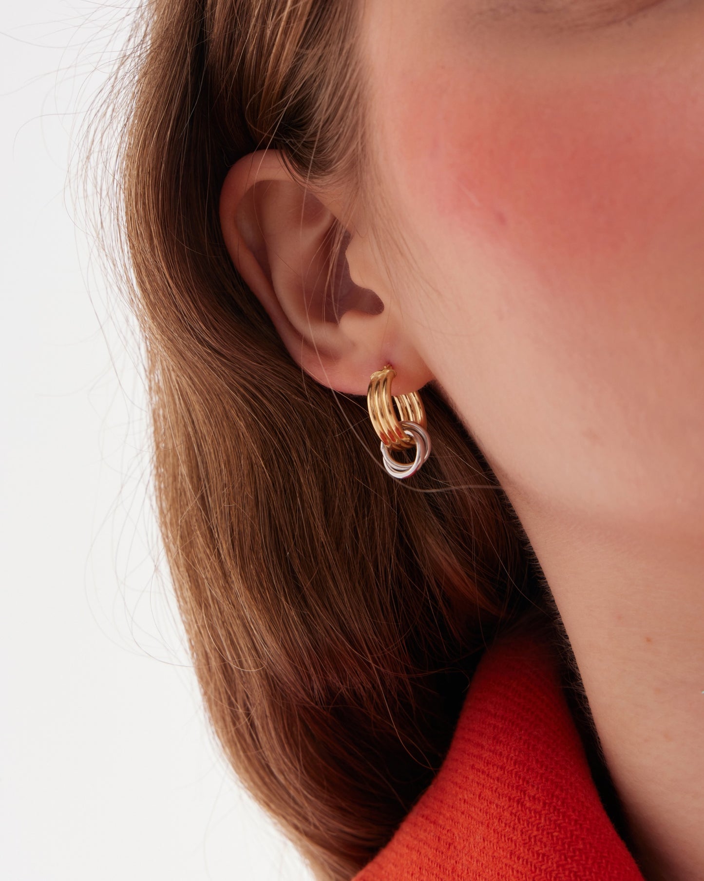Nivola circle hoop earrings in gold and rhodium plated silver