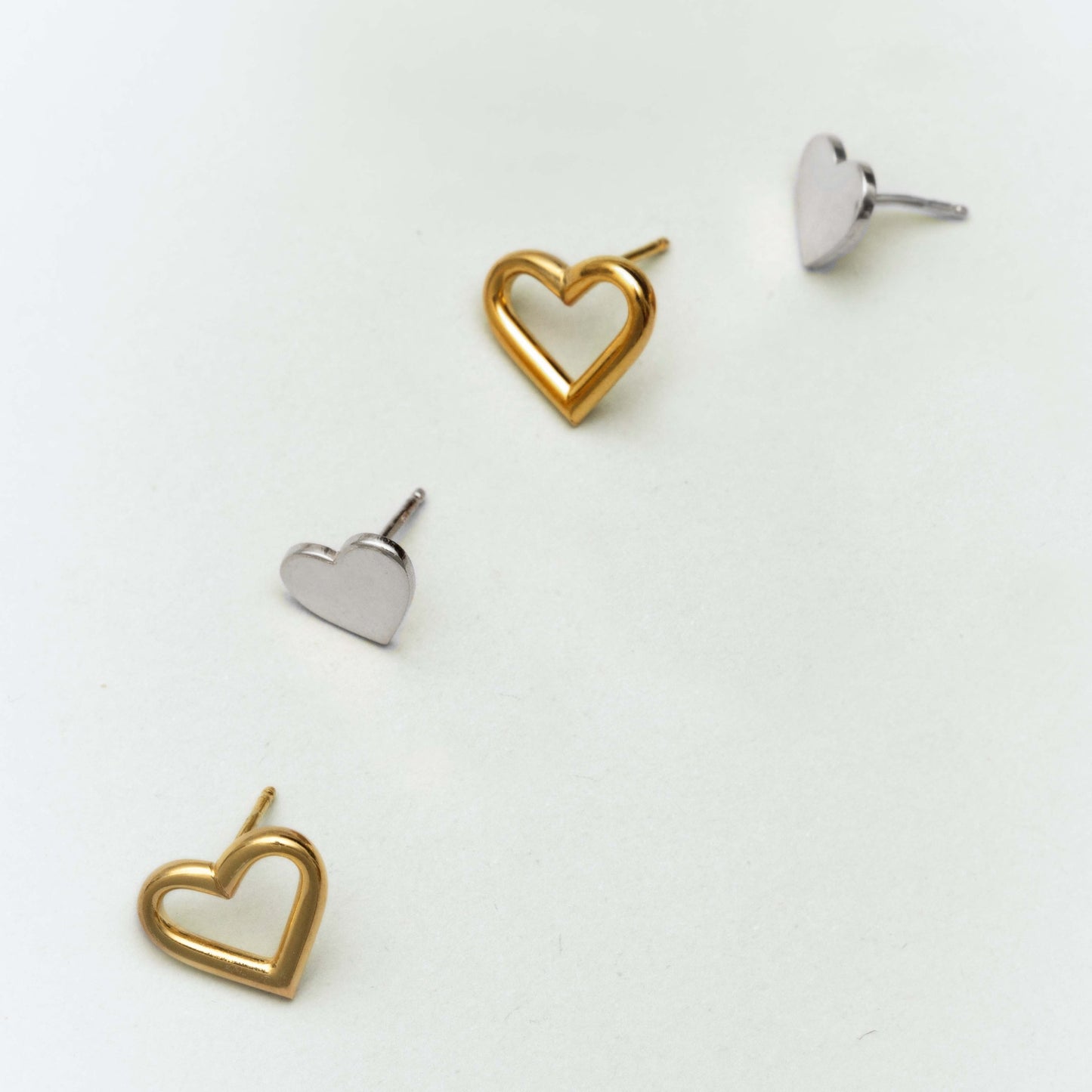 Pendientes botón Sincerely corazón en Plata