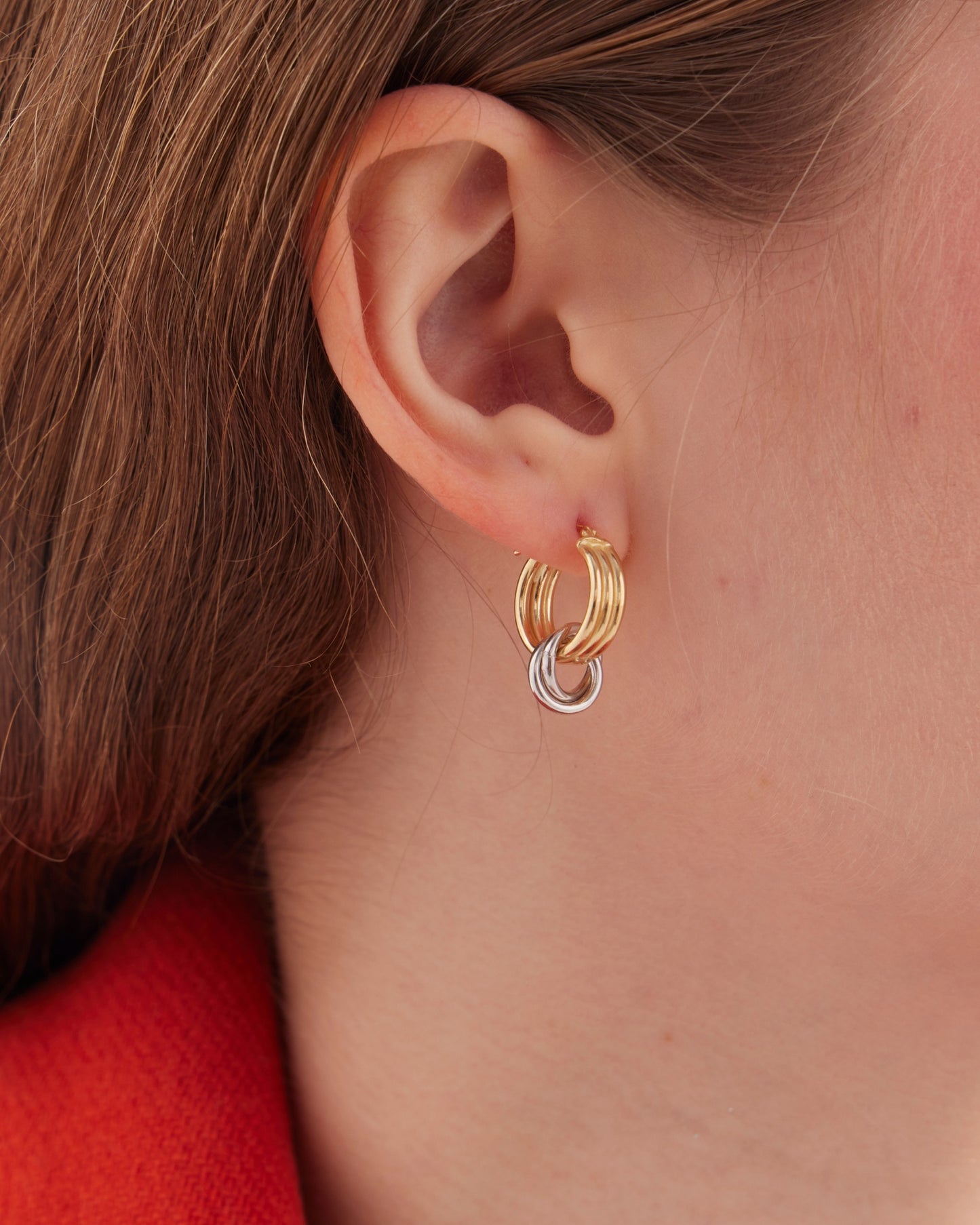 Nivola circle hoop earrings in gold and rhodium plated silver