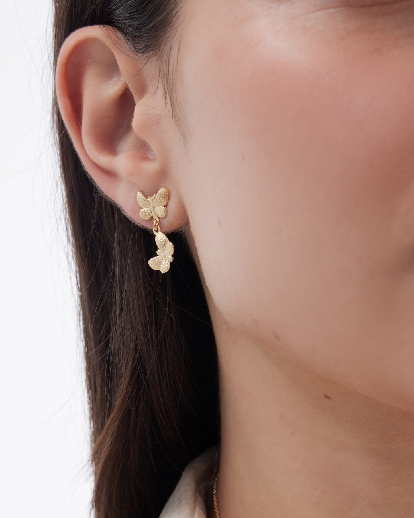 Pendientes largos Fleur mariposa doble en Plata baño Oro