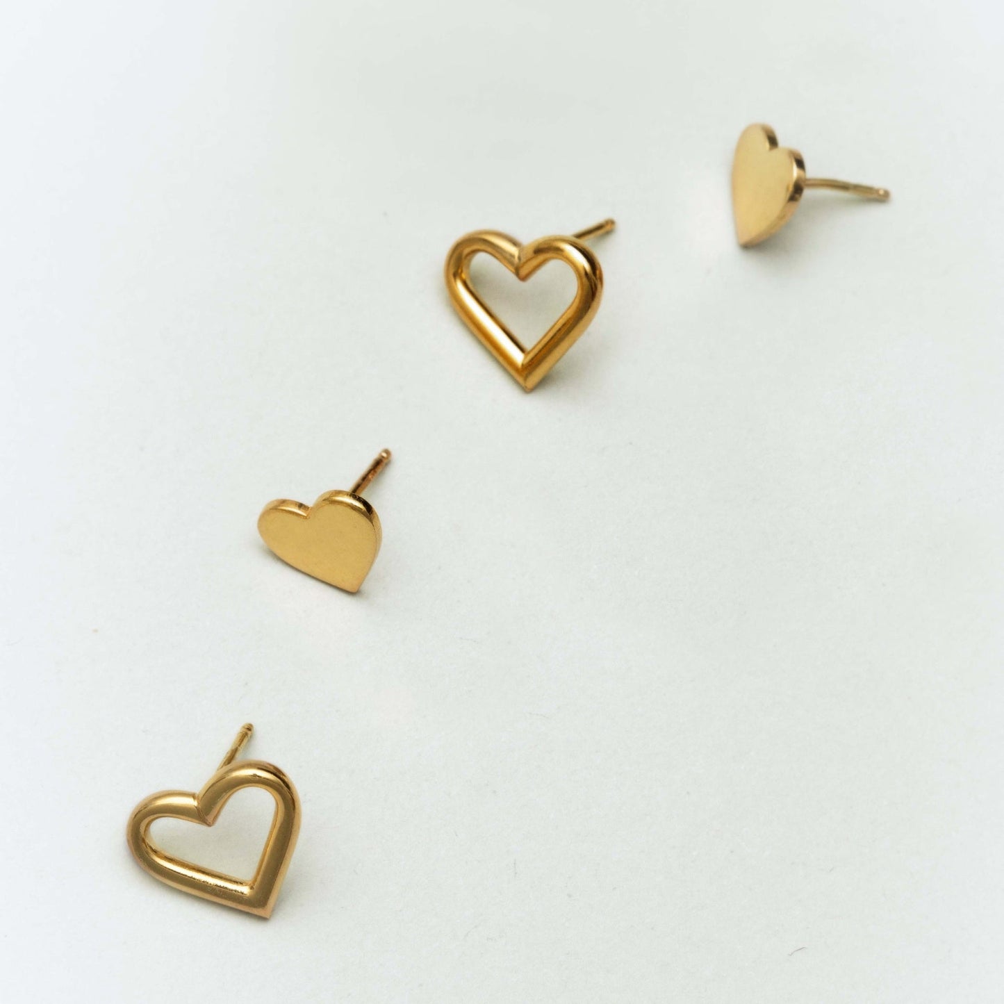 Pendientes botón Sincerely corazón en Plata