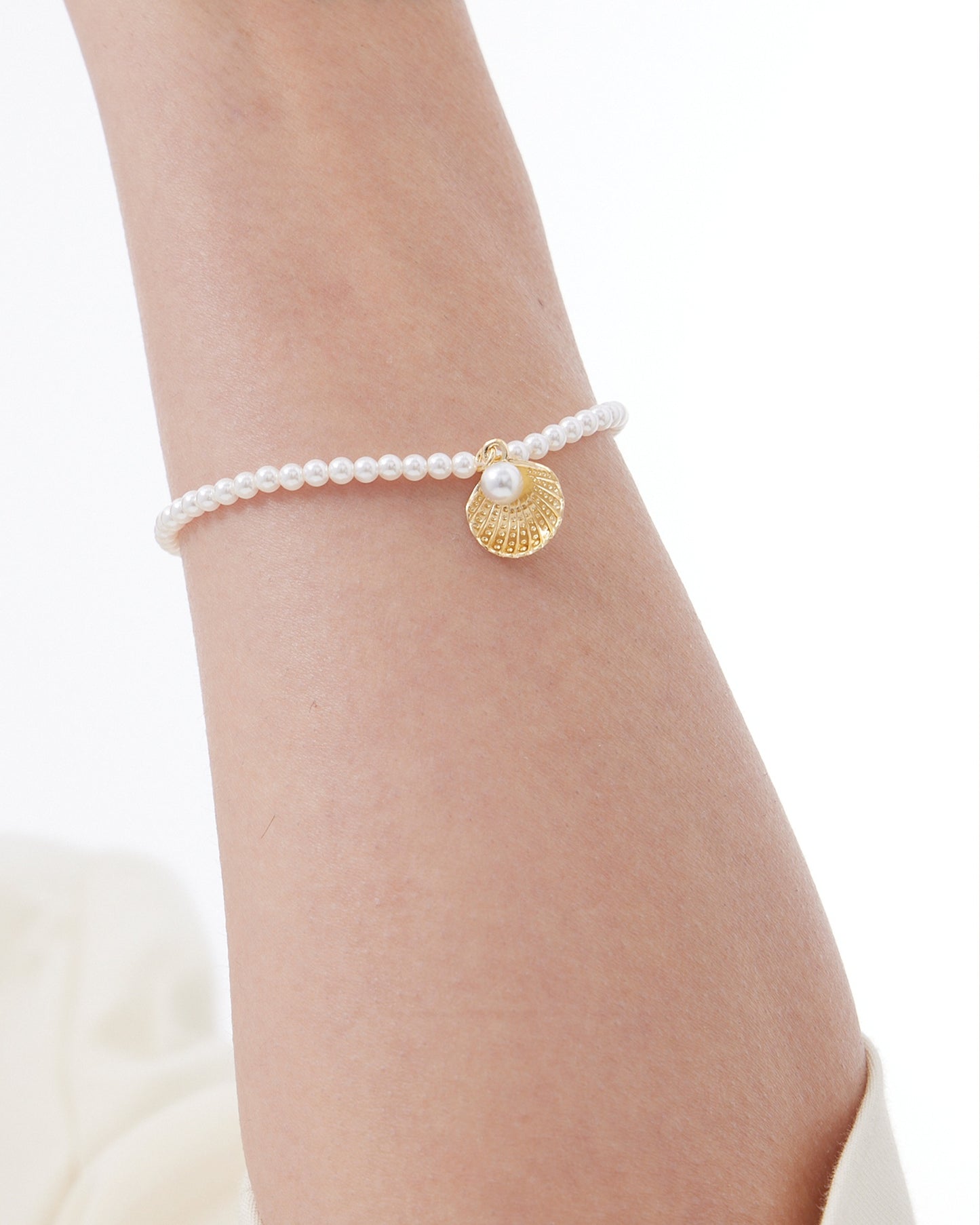 Pulsera Solene concha con perla en Plata baño Oro
